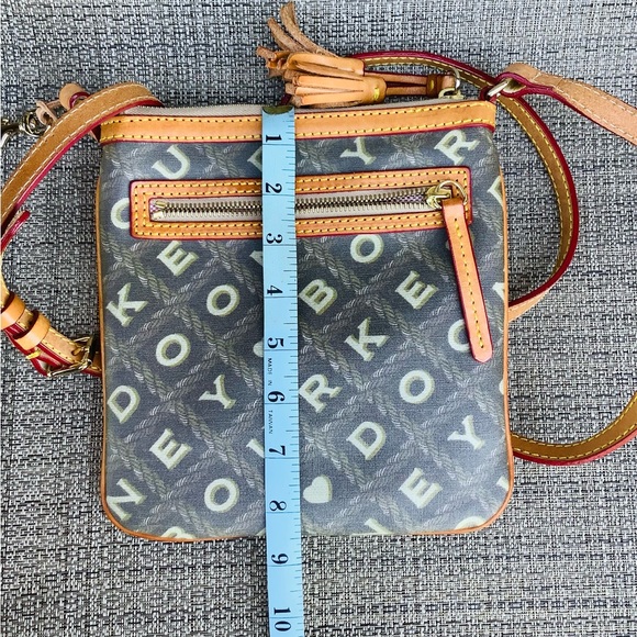 Dooney and Bourke crossbody 🧡🤍🧡 - Picture 11 of 12